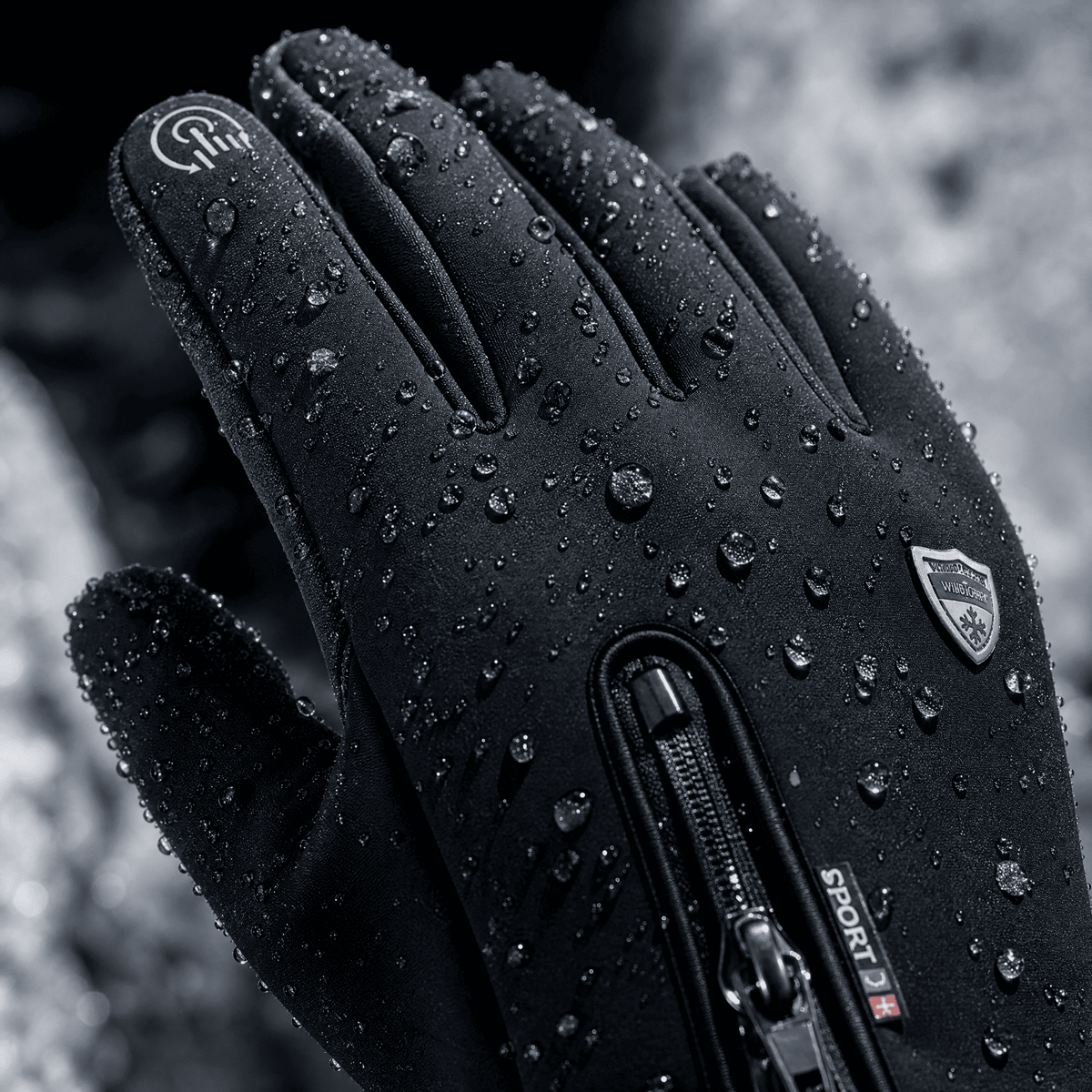 Close-up of the glove with water beading on the repellent outer fabric